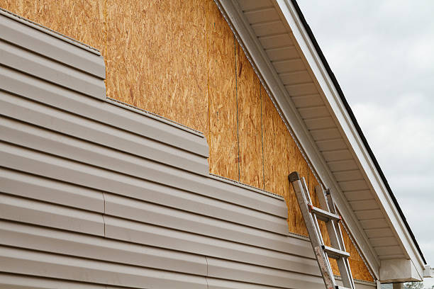 Professional Siding Replacement technician working in Liverpool, NY